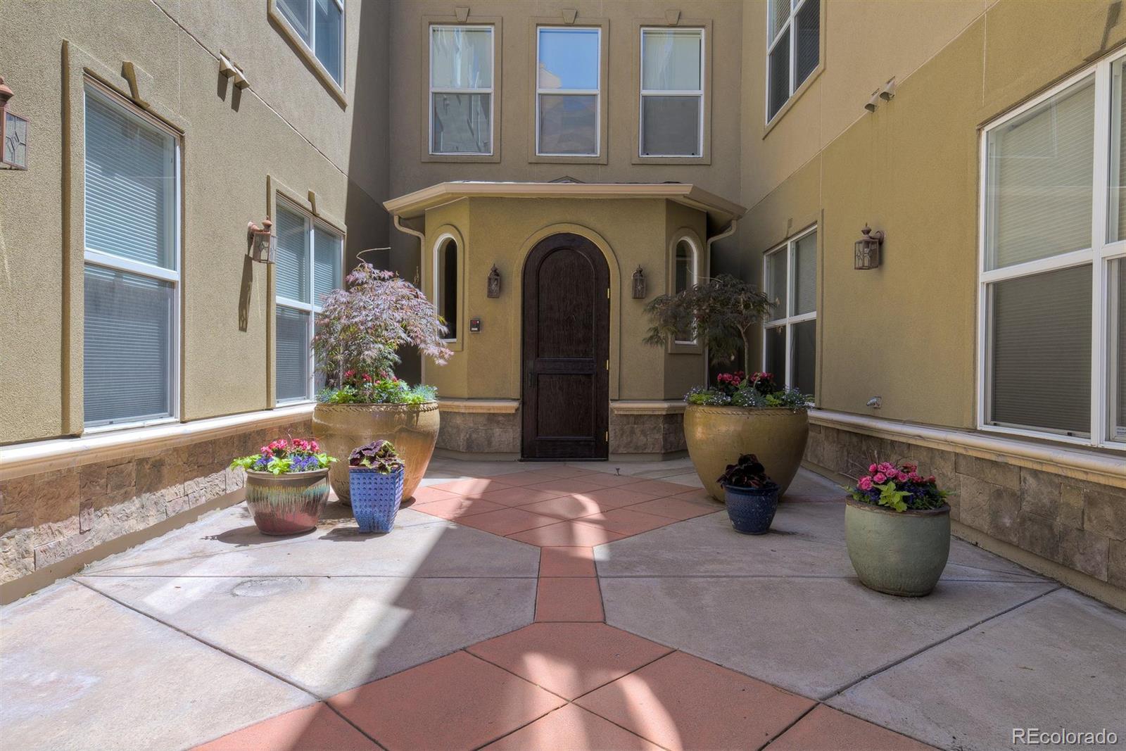 40 Madison Street, Unit 208 Denver, CO 80206 - Photo 2 of 20 a view of an entrance of the building