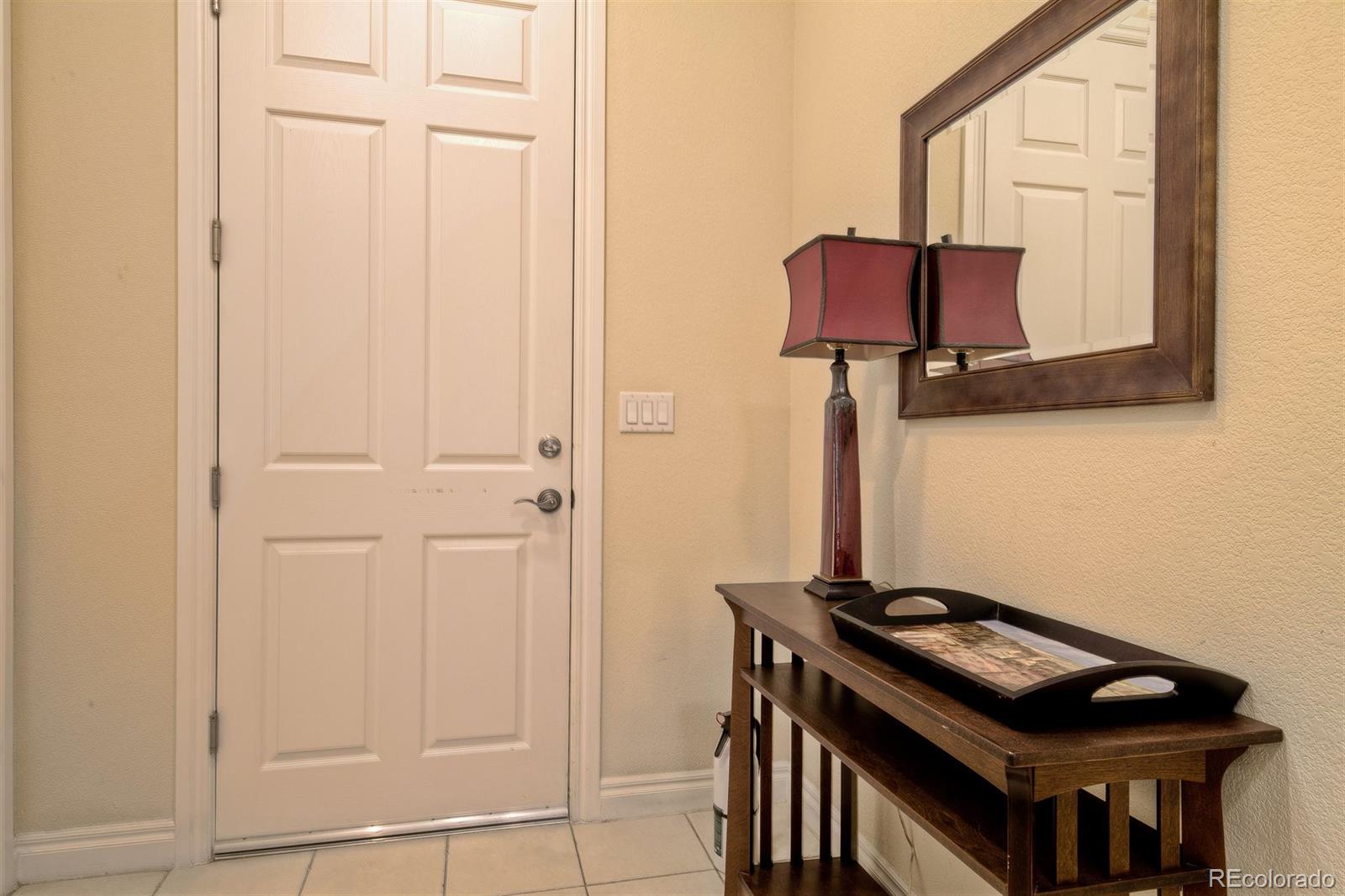 40 Madison Street, Unit 208 Denver, CO 80206 - Photo 3 of 20 a bathroom with a sink and a mirror