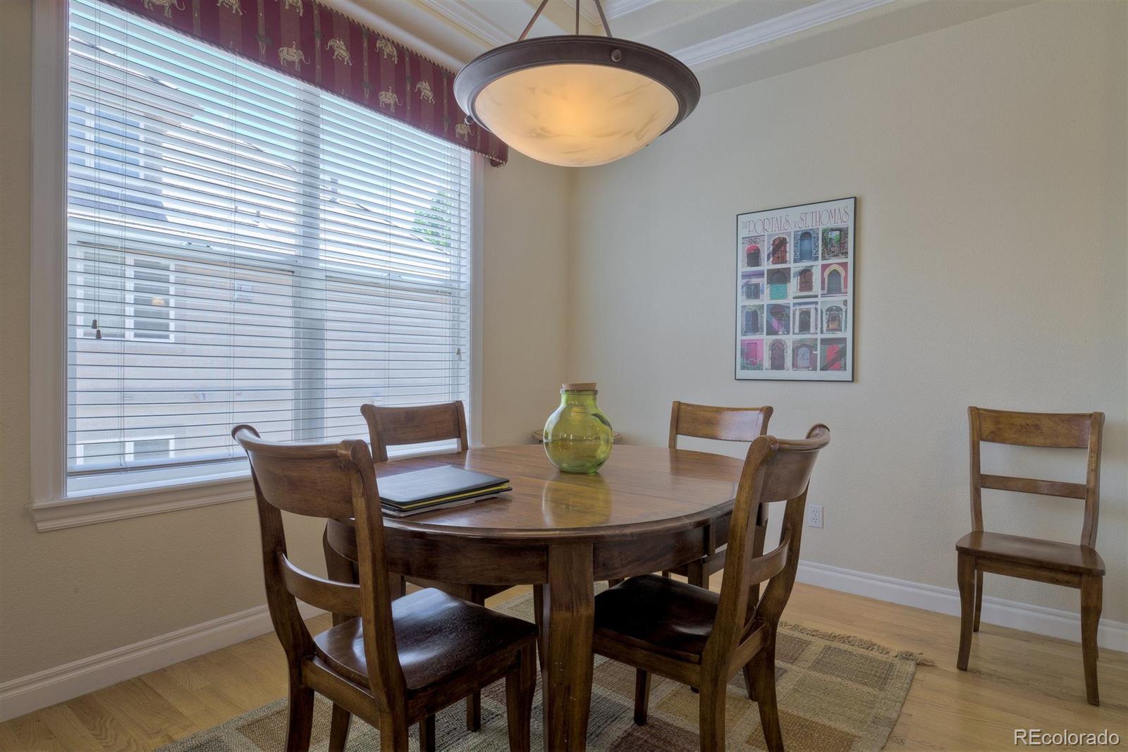 40 Madison Street, Unit 208 Denver, CO 80206 - Photo 8 of 20 a dining room with furniture and window