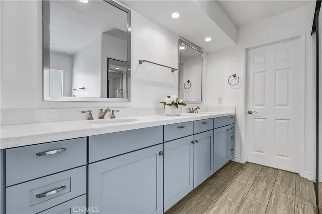 a spacious bathroom with a bathtub and a shower