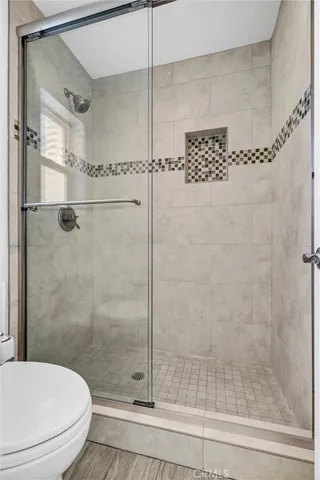 a view of a kitchen with a sink hardwood floor and a window