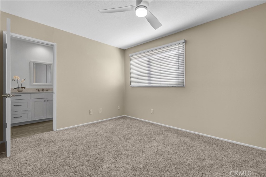 28661 Charreadas Laguna Niguel, CA 92677 - Photo 21 of 29 a view of a kitchen with a sink hardwood floor and a window