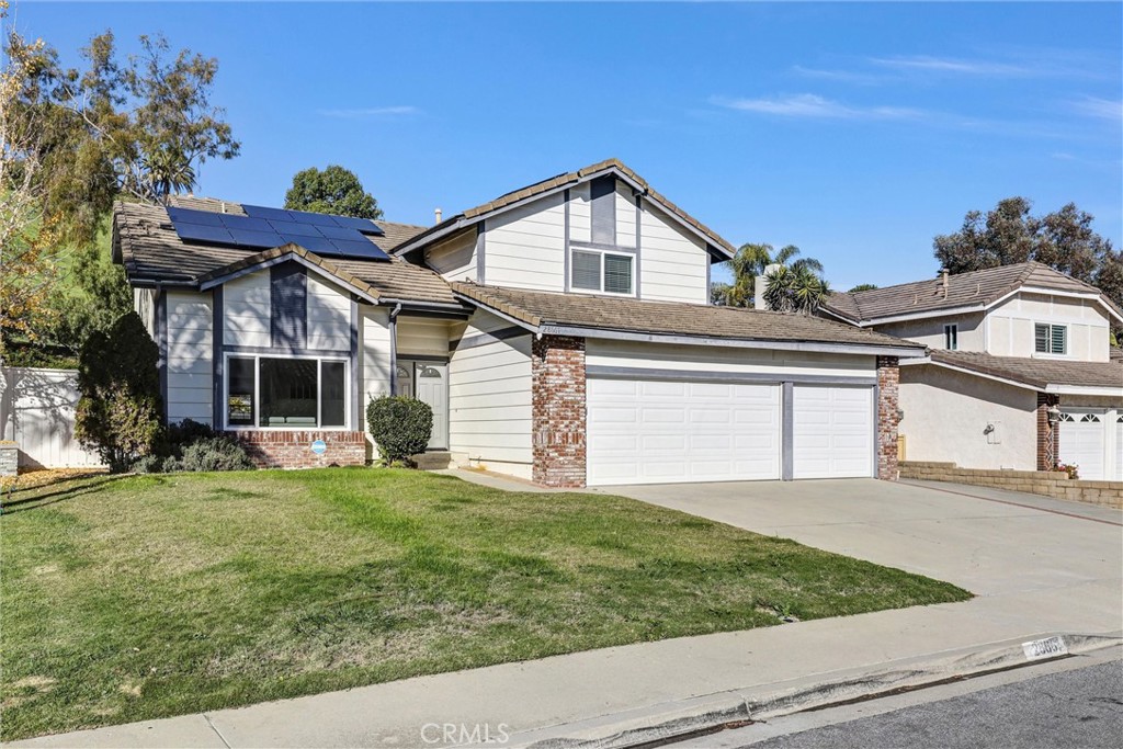 28661 Charreadas Laguna Niguel, CA 92677 - Photo 25 of 29 a front view of a house with a garden