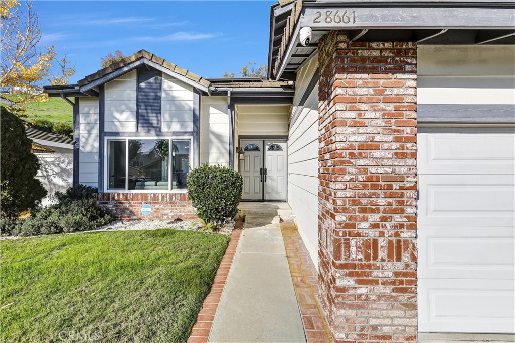 28661 Charreadas Laguna Niguel, CA 92677 - Photo 26 of 29 a front view of a house with a yard