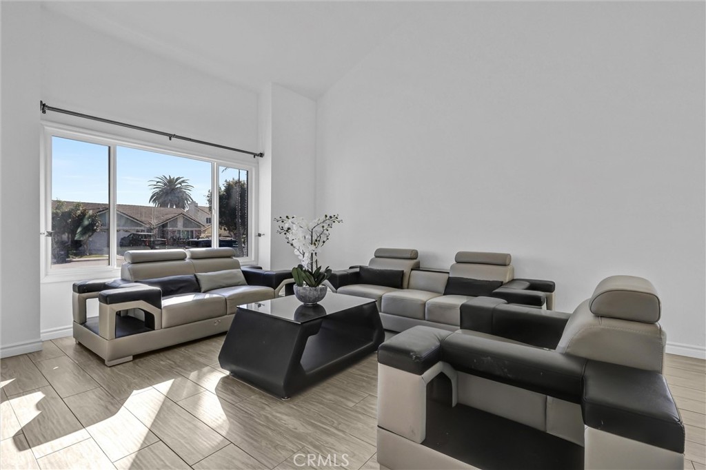 28661 Charreadas Laguna Niguel, CA 92677 - Photo 27 of 29 a living room with furniture and a large window