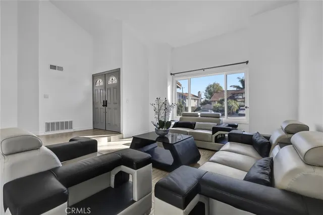 a kitchen with a stove a sink and a refrigerator