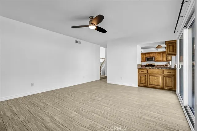 a bathroom with a toilet sink and shower
