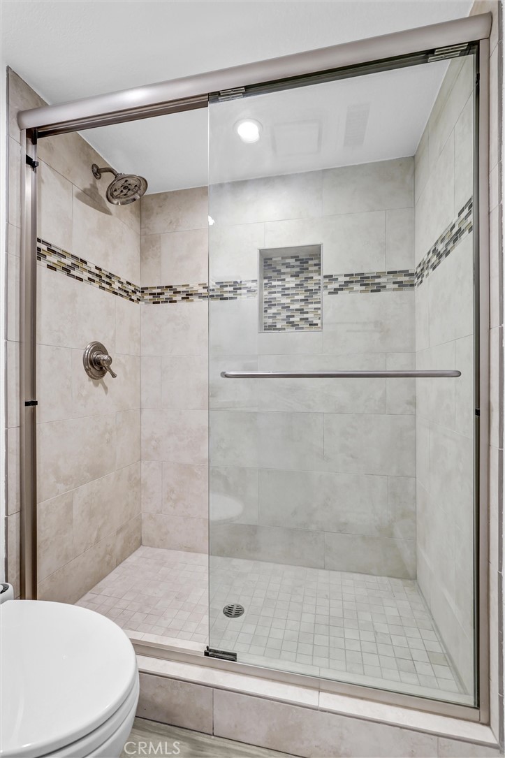28661 Charreadas Laguna Niguel, CA 92677 - Photo 10 of 29 a bathroom with a shower and a toilet