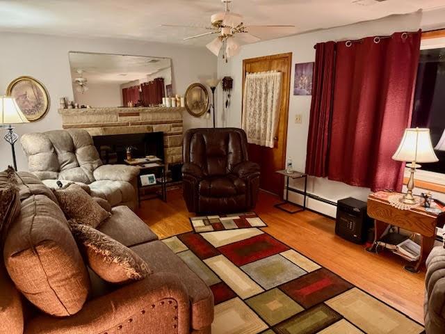 65 Glenn Road Mercer, PA 16137 - Photo 11 of 44 a living room with furniture and a fireplace