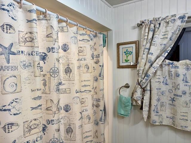 65 Glenn Road Mercer, PA 16137 - Photo 15 of 44 a bathroom with a shower curtain and a sink