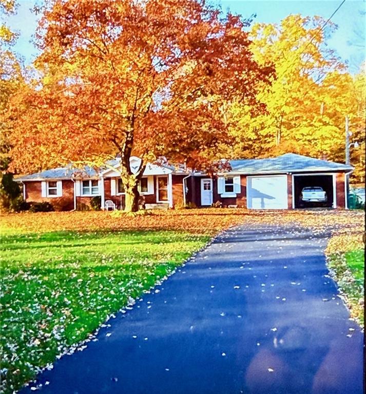 65 Glenn Road Mercer, PA 16137 - Photo 2 of 44 front view of a house with a yard