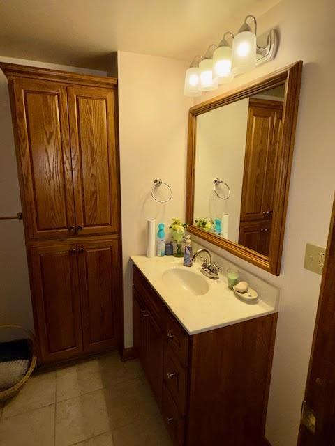 65 Glenn Road Mercer, PA 16137 - Photo 24 of 44 a bathroom with a sink vanity and a mirror