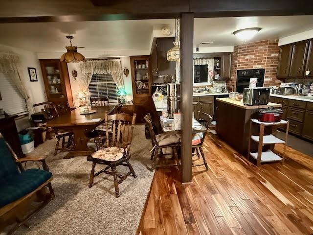 65 Glenn Road Mercer, PA 16137 - Photo 10 of 44 a view of a dining room with lots of furniture and wooden floor
