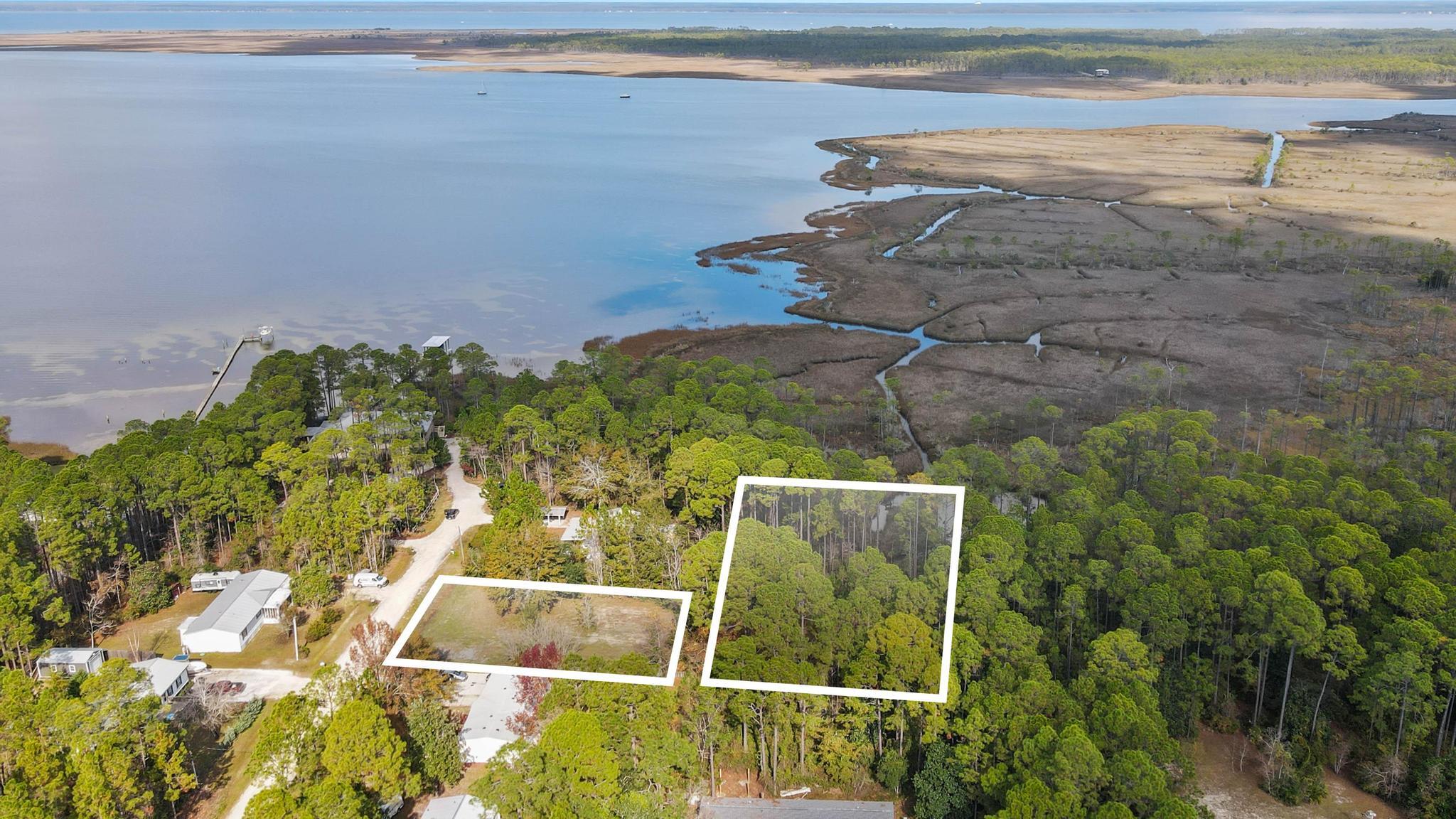 64 21st Street Santa Rosa Beach, FL 32459 - Photo 2 of 16 a view of a backyard
