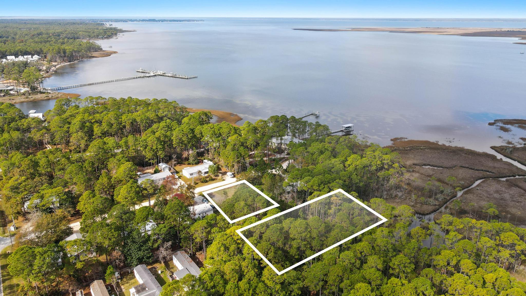 64 21st Street Santa Rosa Beach, FL 32459 - Photo 3 of 16 a view of a yard