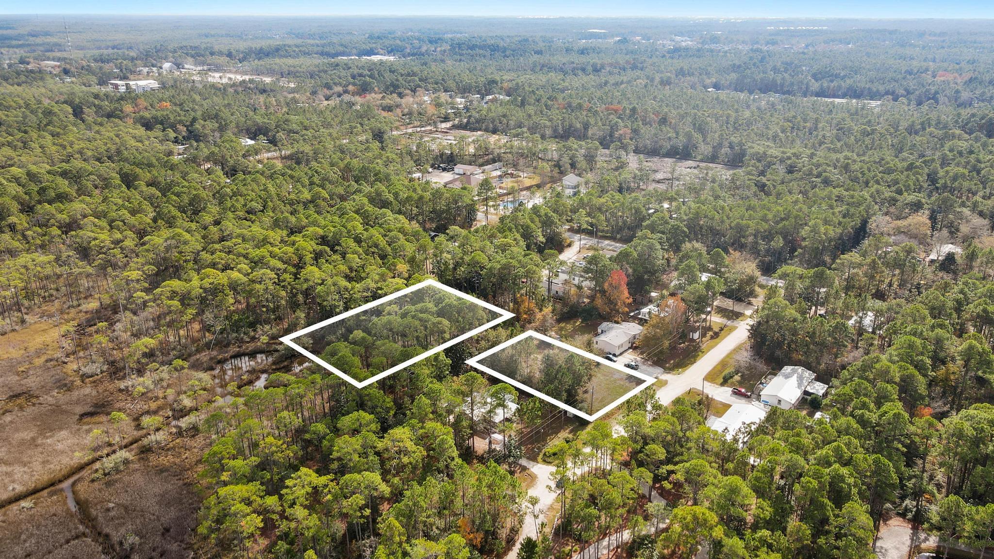 64 21st Street Santa Rosa Beach, FL 32459 - Photo 6 of 16 an aerial view of house with yard