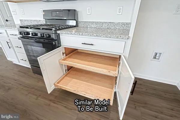 a utility room with washer and dryer