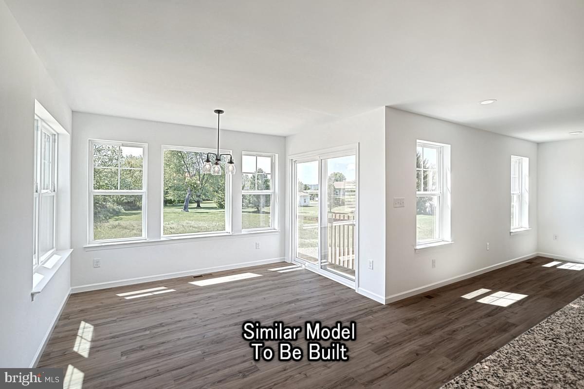 Meriwether Plan At The Seasons Dover, PA 17315 - Photo 15 of 30 a view of an empty room with a window