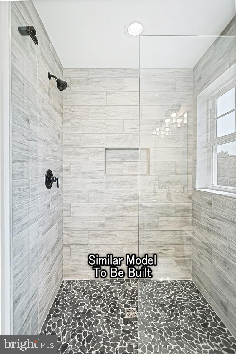 Meriwether Plan At The Seasons Dover, PA 17315 - Photo 21 of 30 a bathroom with a shower