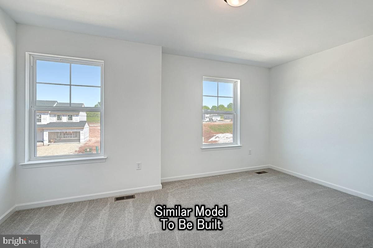 Meriwether Plan At The Seasons Dover, PA 17315 - Photo 24 of 30 an empty room with a window