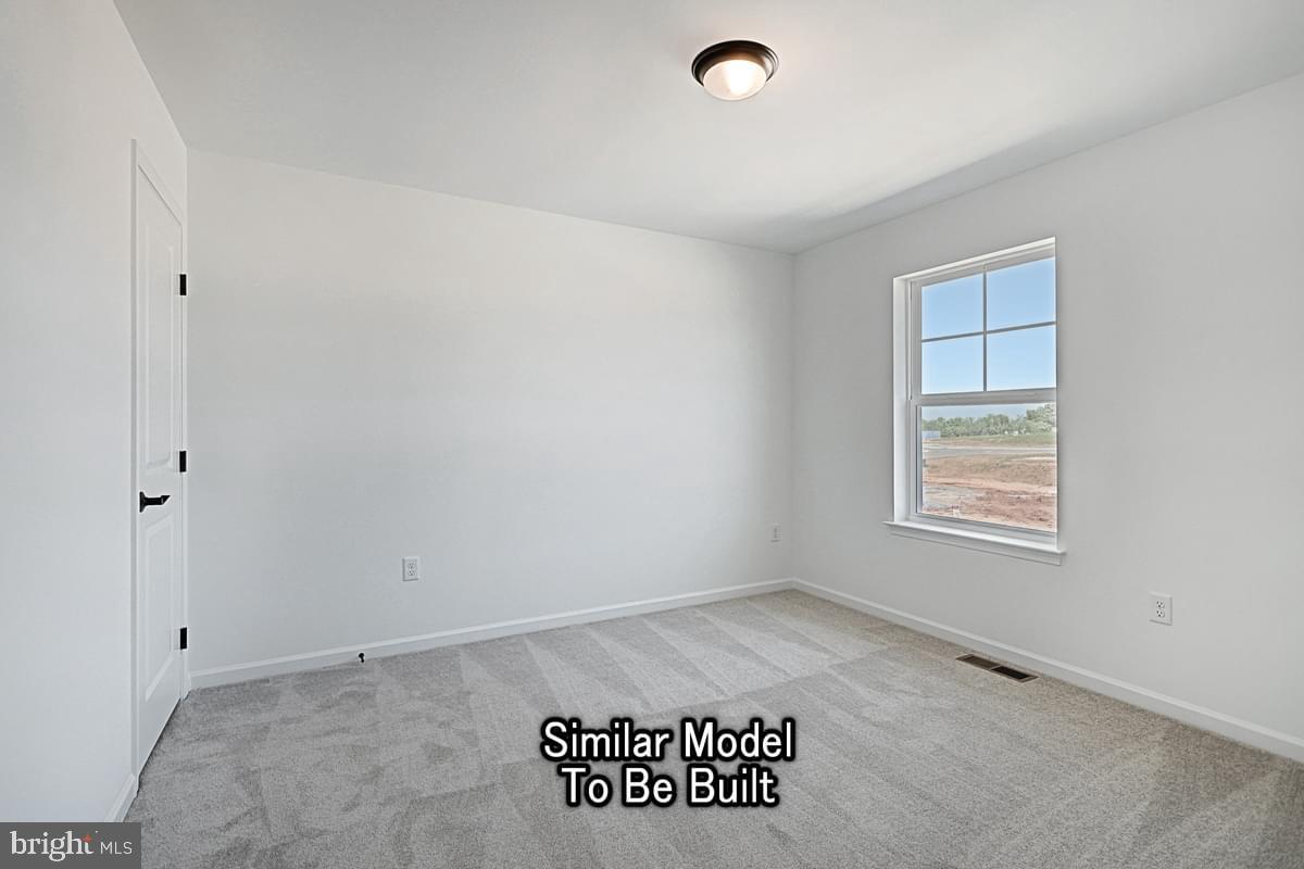 Meriwether Plan At The Seasons Dover, PA 17315 - Photo 26 of 30 an empty room with a window