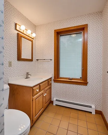 a bathroom with a tub and shower