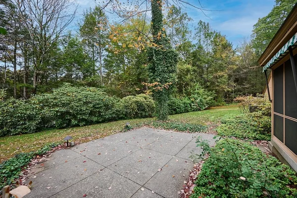 a view of backyard with green space