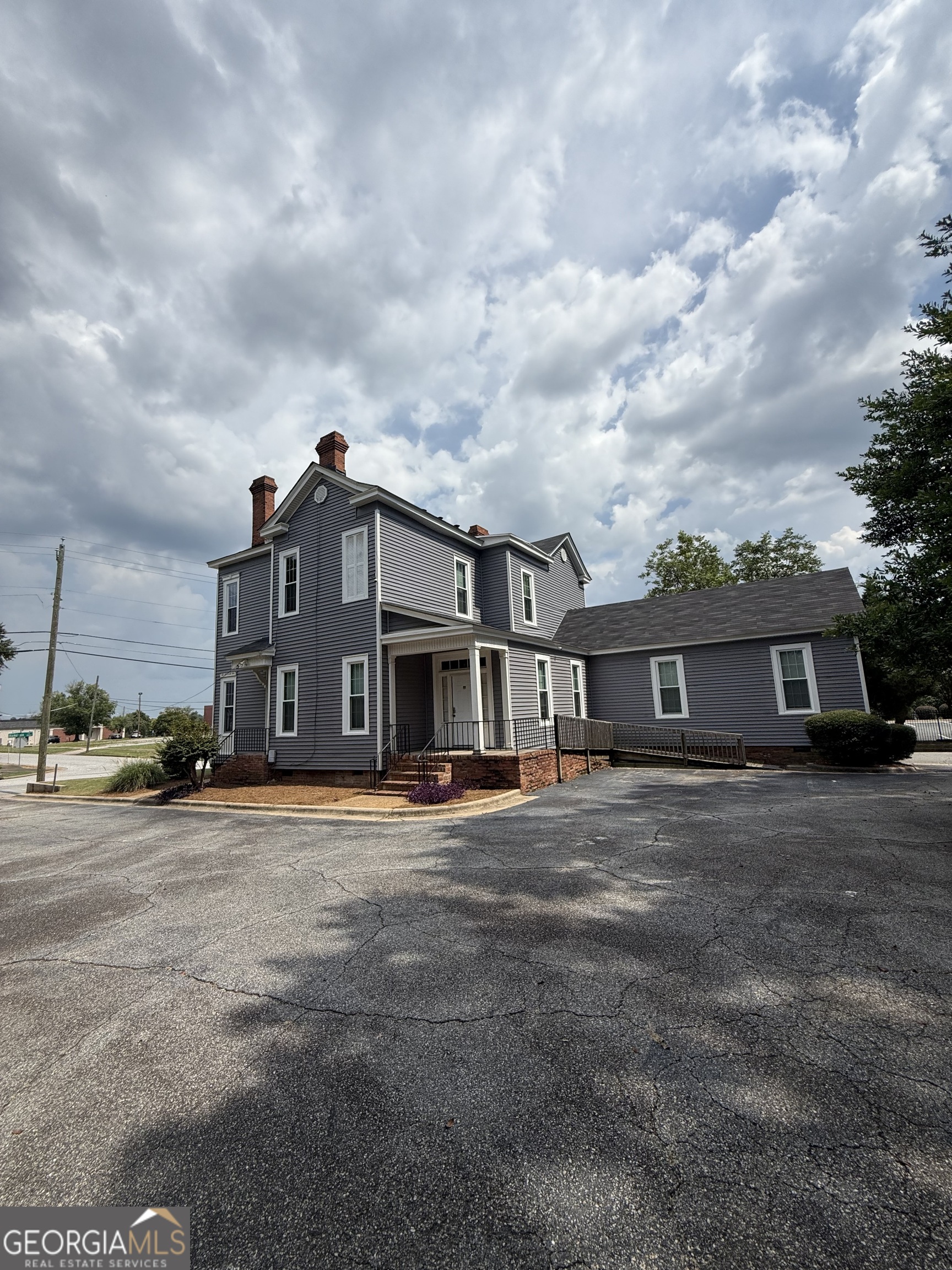 2001 Hamilton Road Columbus, GA 31904 - Photo 3 of 23 a big house with a big yard and large trees