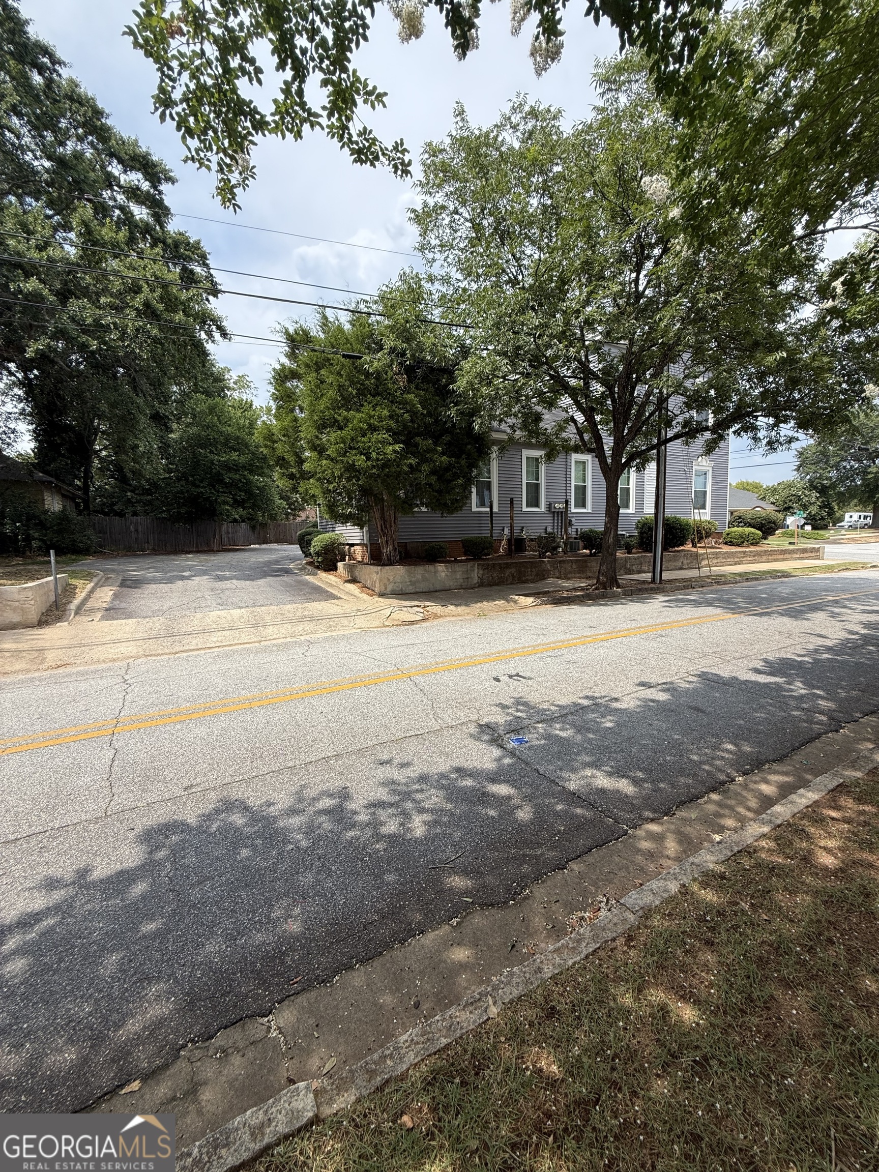 2001 Hamilton Road Columbus, GA 31904 - Photo 5 of 23 a backyard of a house with large trees