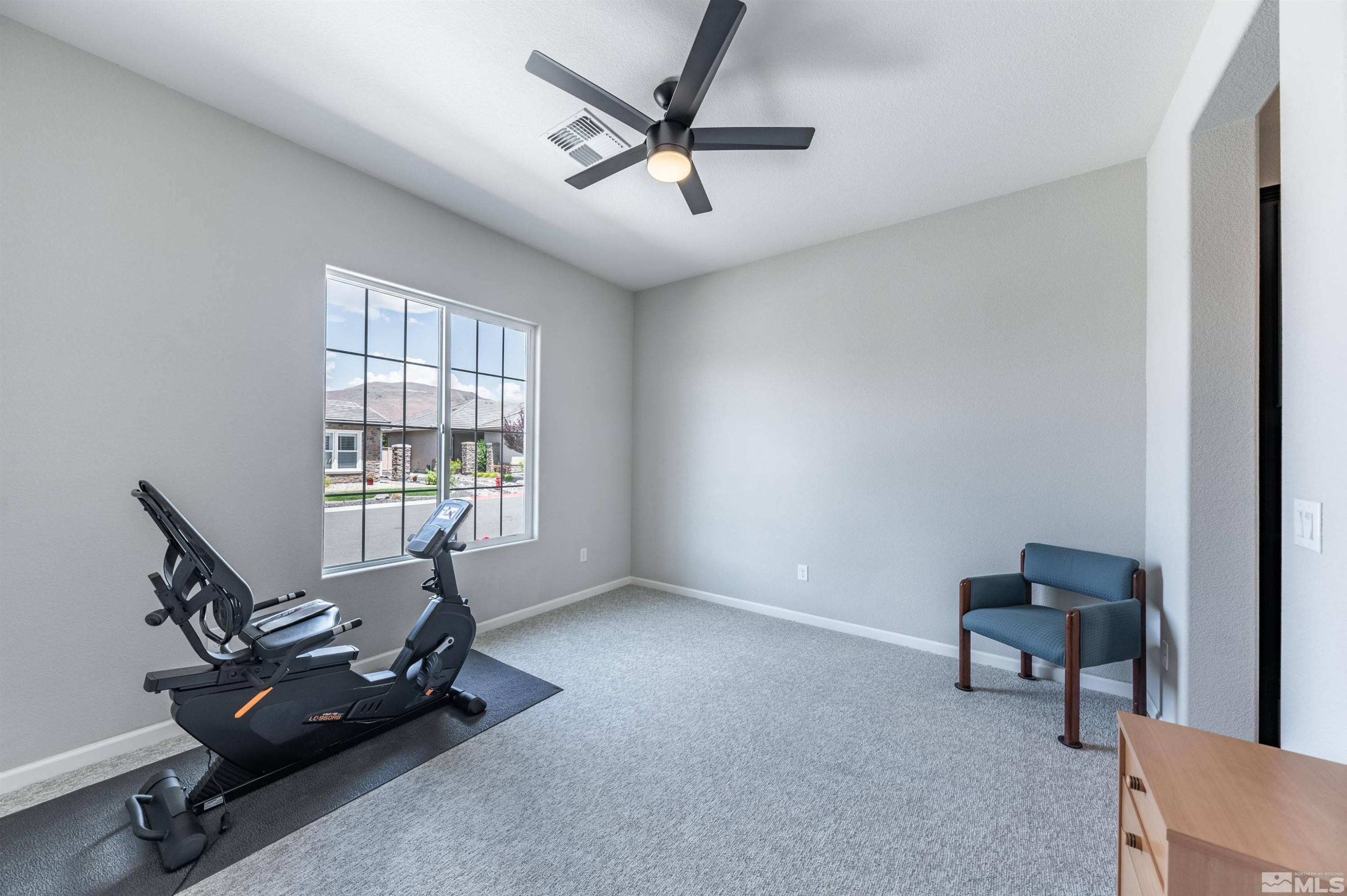 2084 Phaethon Lane Reno, NV 89521 - Photo 14 of 35 a living room with furniture and a window
