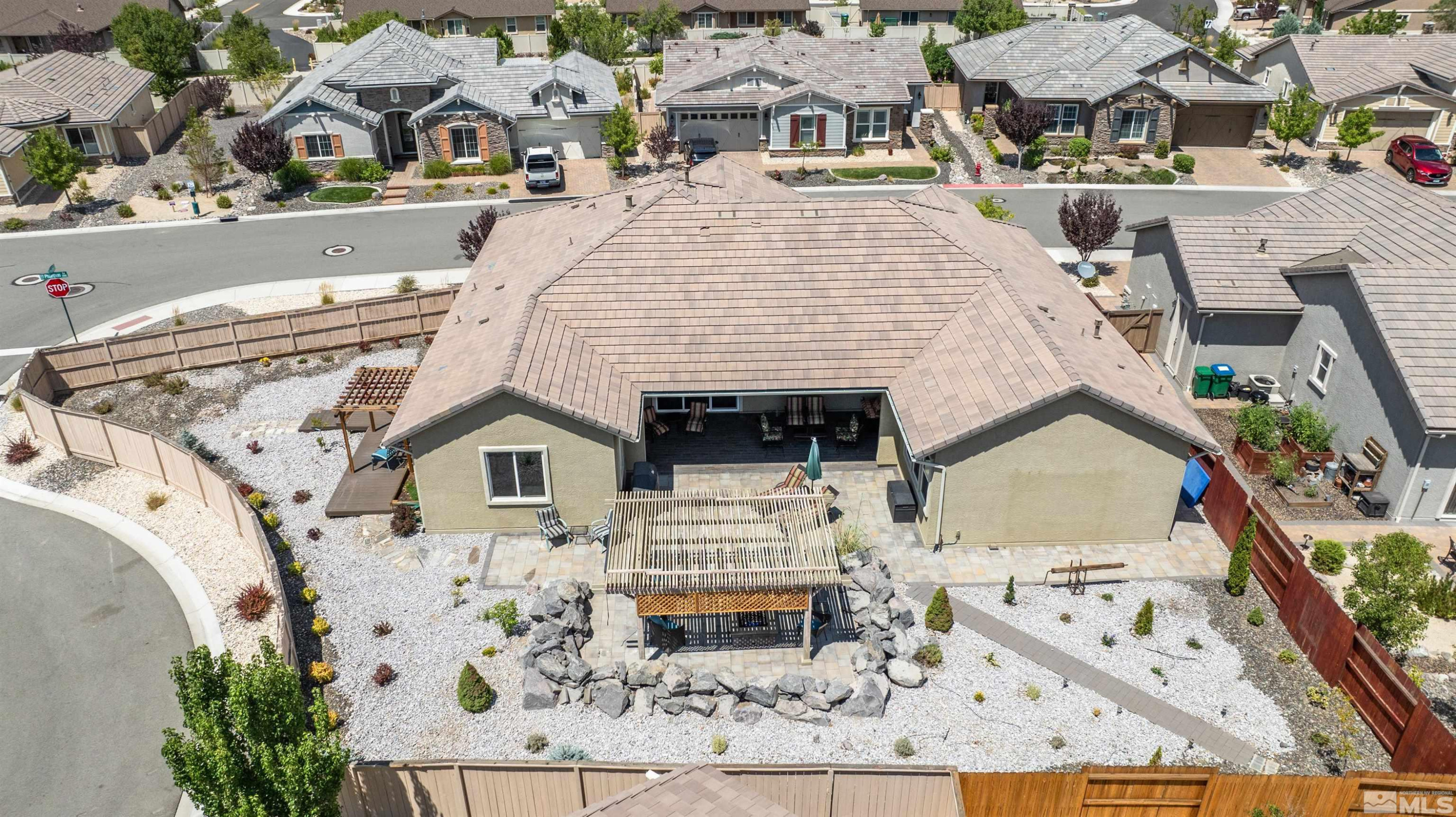 2084 Phaethon Lane Reno, NV 89521 - Photo 24 of 35 an aerial view of a house with large trees