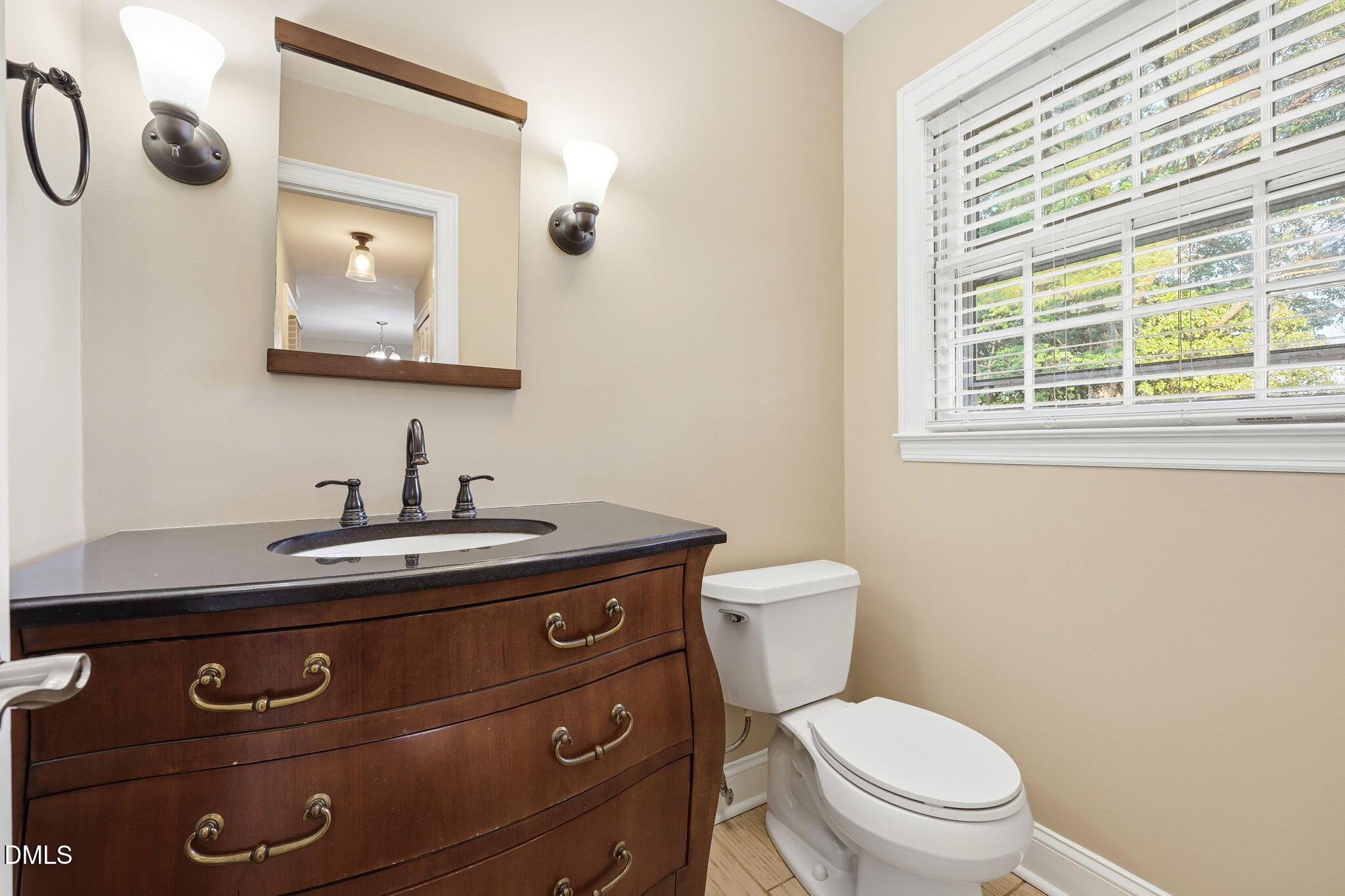 1130 Prospect Church Road Dunn, NC 28334 - Photo 8 of 47 a bathroom with a toilet a sink and mirror