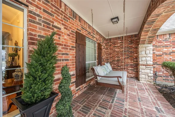 a bench sitting in front of a building
