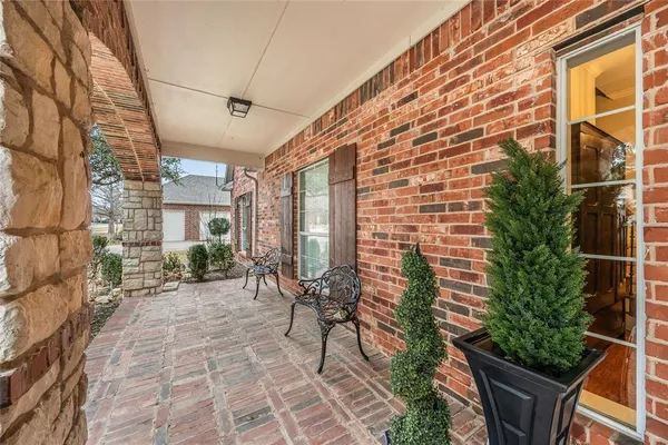 a view of yard with patio