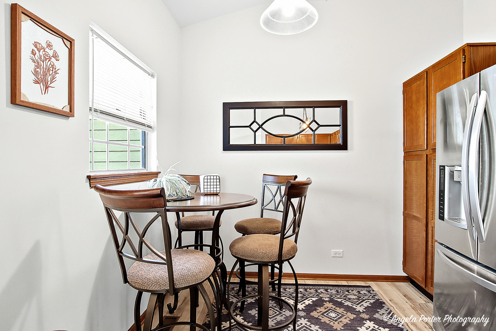 911 Ann Arbor Lane, Unit 253 Vernon Hills, IL 60061 - Photo 12 of 26 a view of a dining room with furniture and a window
