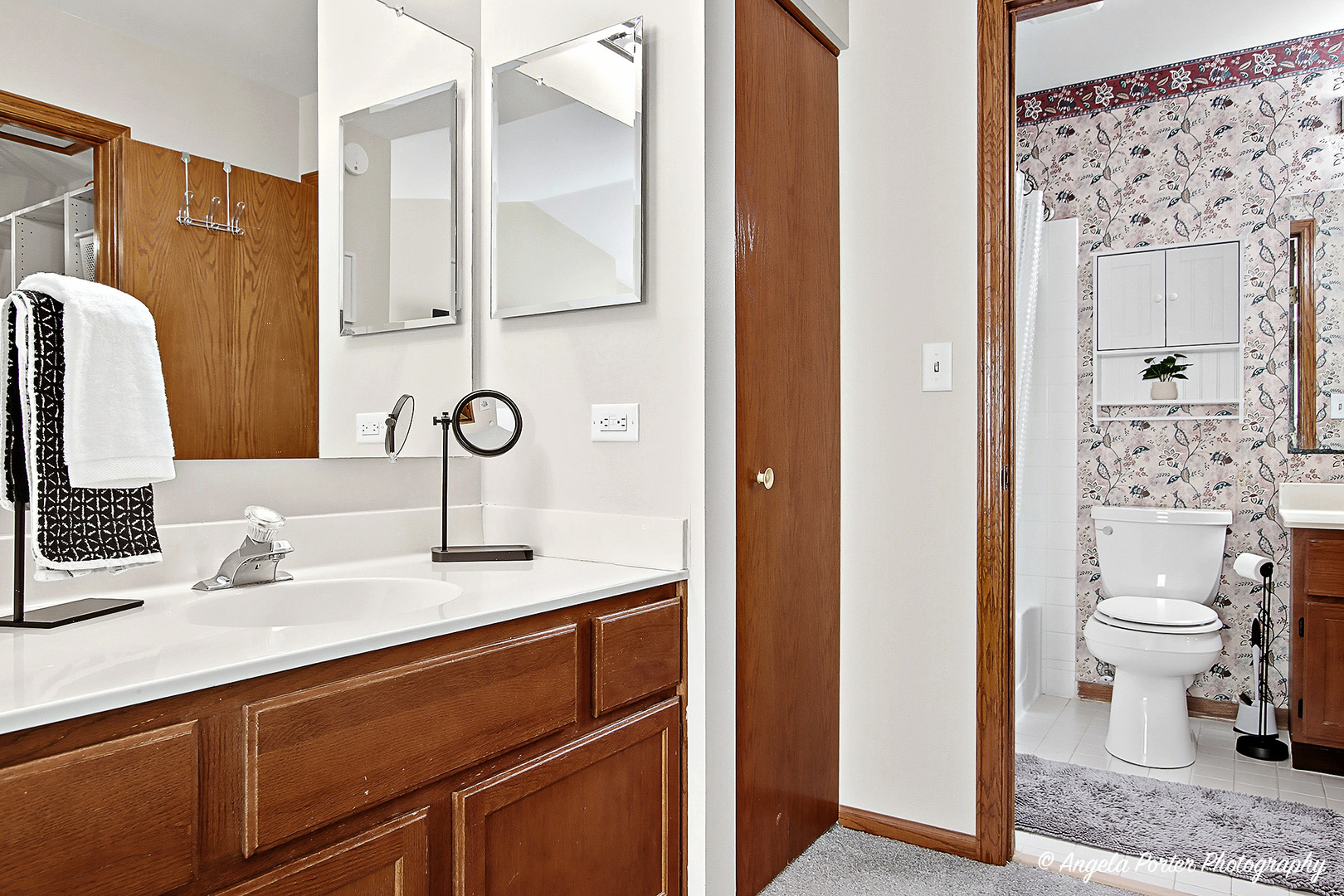 911 Ann Arbor Lane, Unit 253 Vernon Hills, IL 60061 - Photo 16 of 26 a bathroom with a sink and a mirror
