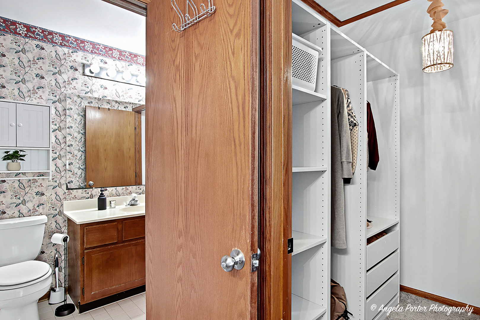 911 Ann Arbor Lane, Unit 253 Vernon Hills, IL 60061 - Photo 17 of 26 a bathroom with a sink a toilet and shower