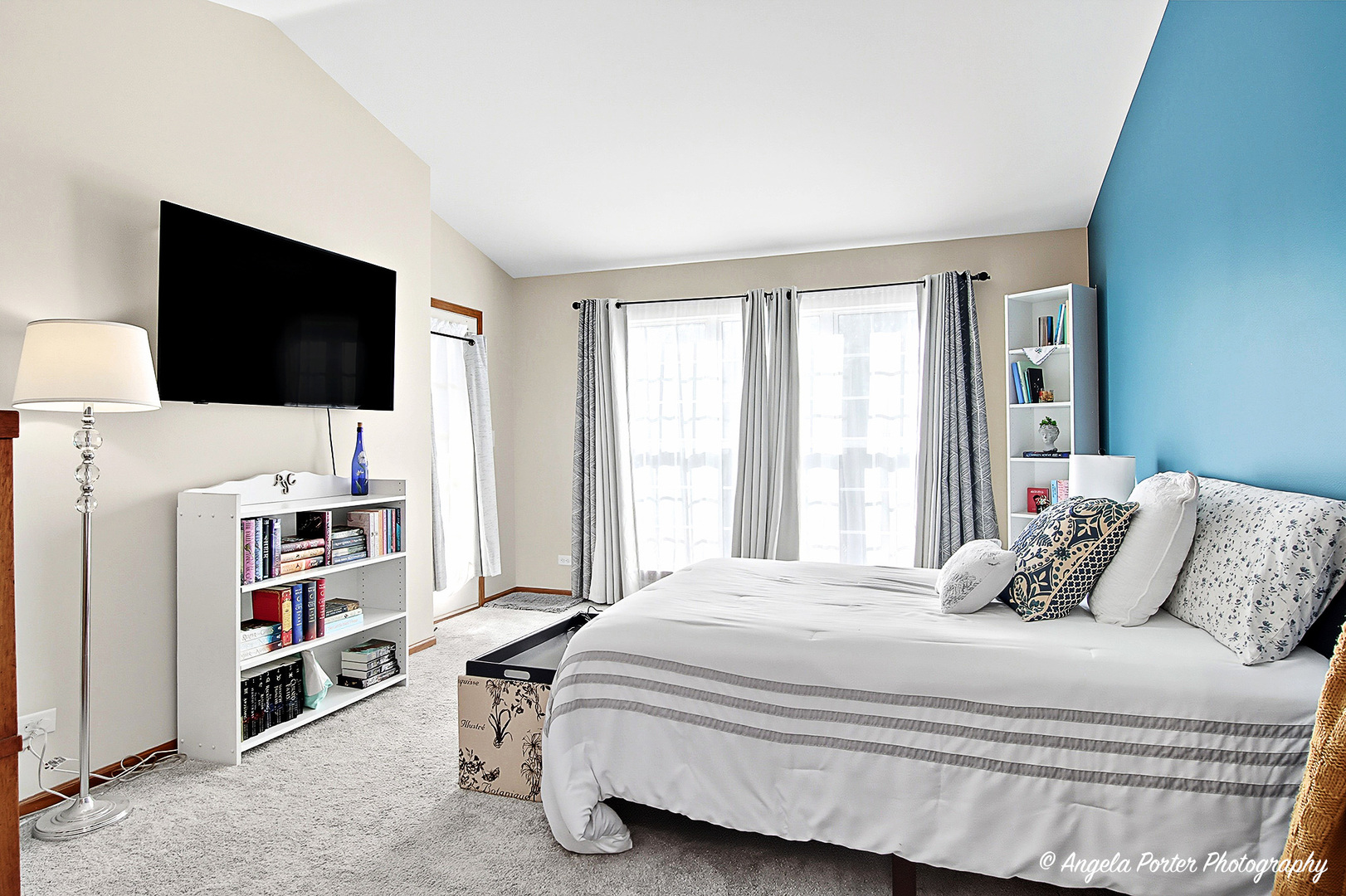 911 Ann Arbor Lane, Unit 253 Vernon Hills, IL 60061 - Photo 18 of 26 a bedroom with a bed and a flat screen tv