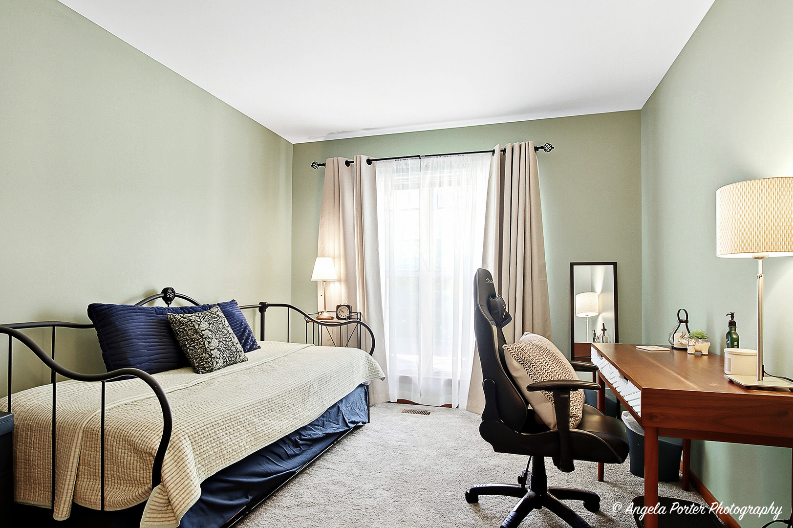 911 Ann Arbor Lane, Unit 253 Vernon Hills, IL 60061 - Photo 22 of 26 a bedroom with a bed a desk and chair