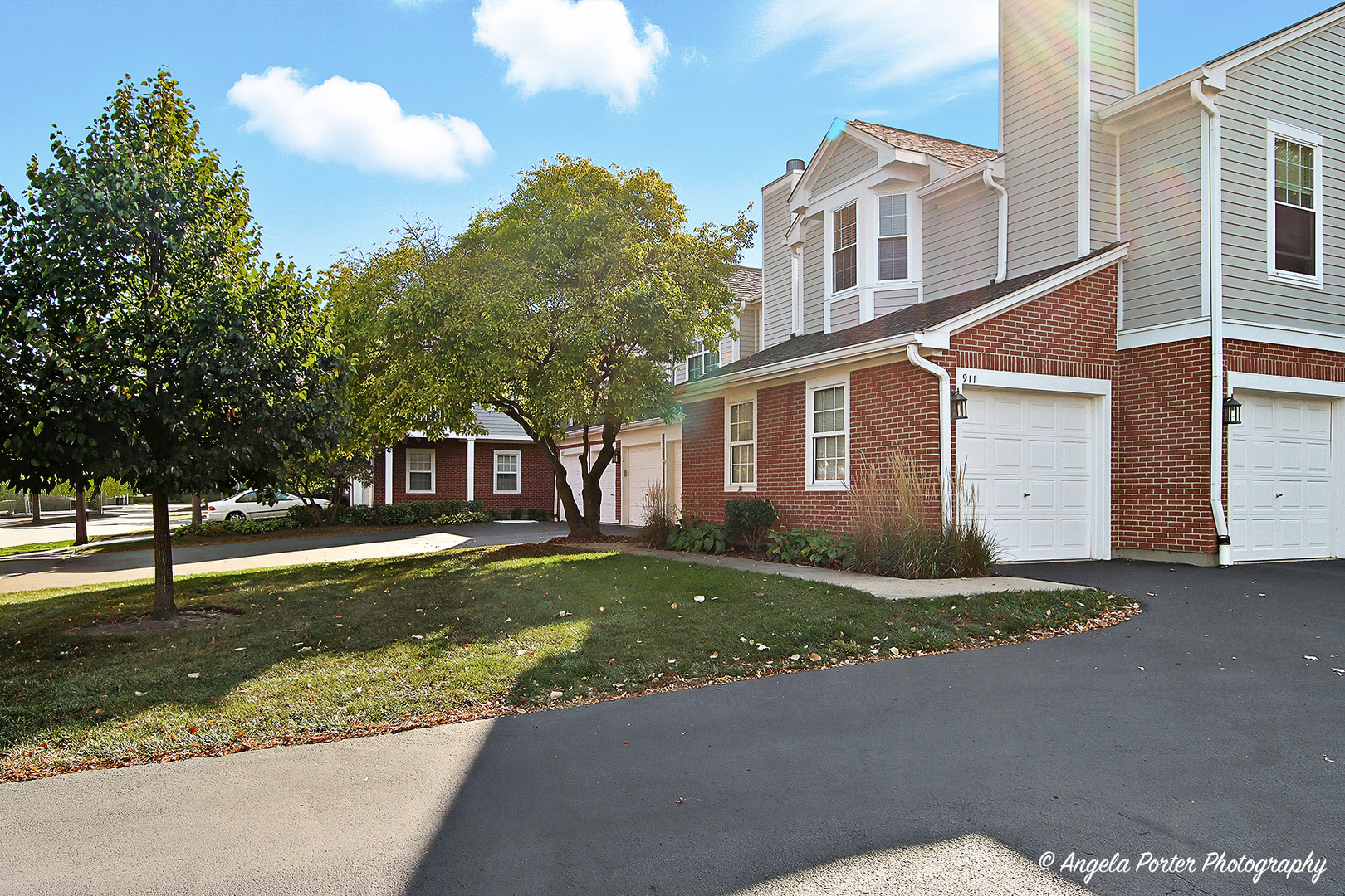911 Ann Arbor Lane, Unit 253 Vernon Hills, IL 60061 - Photo 26 of 26 a front view of a house with a yard
