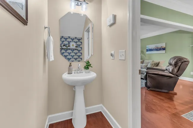 a view of a hallway with seating area