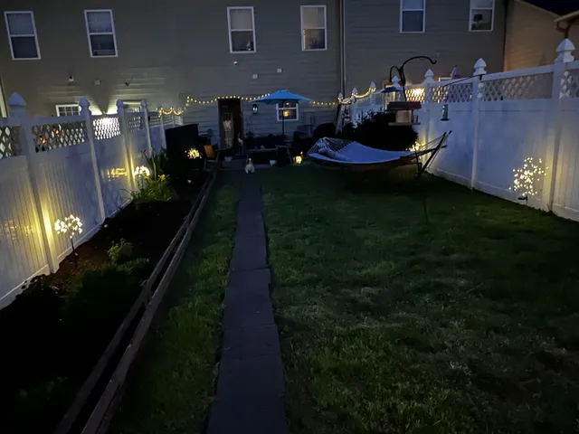a garden view with a potted plant
