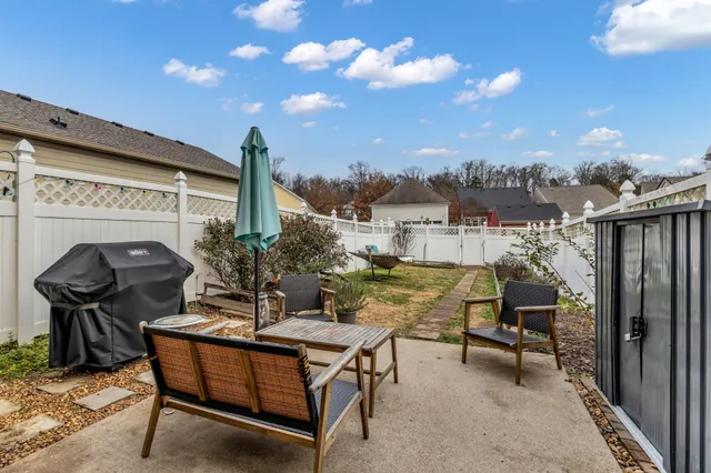 a view of a dinning tables and chairs in the patio