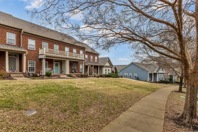 a front view of a house with swimming pool