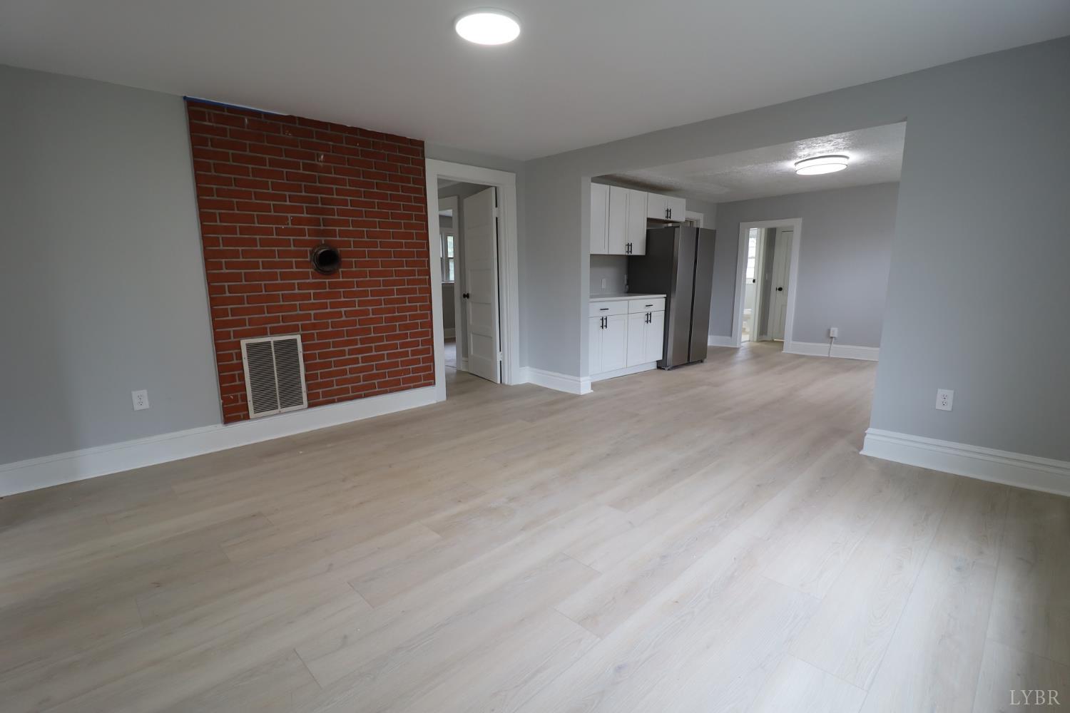 2079 Pin Oak Road Prospect, VA 23960 - Photo 7 of 8 a view of a livingroom with an empty space