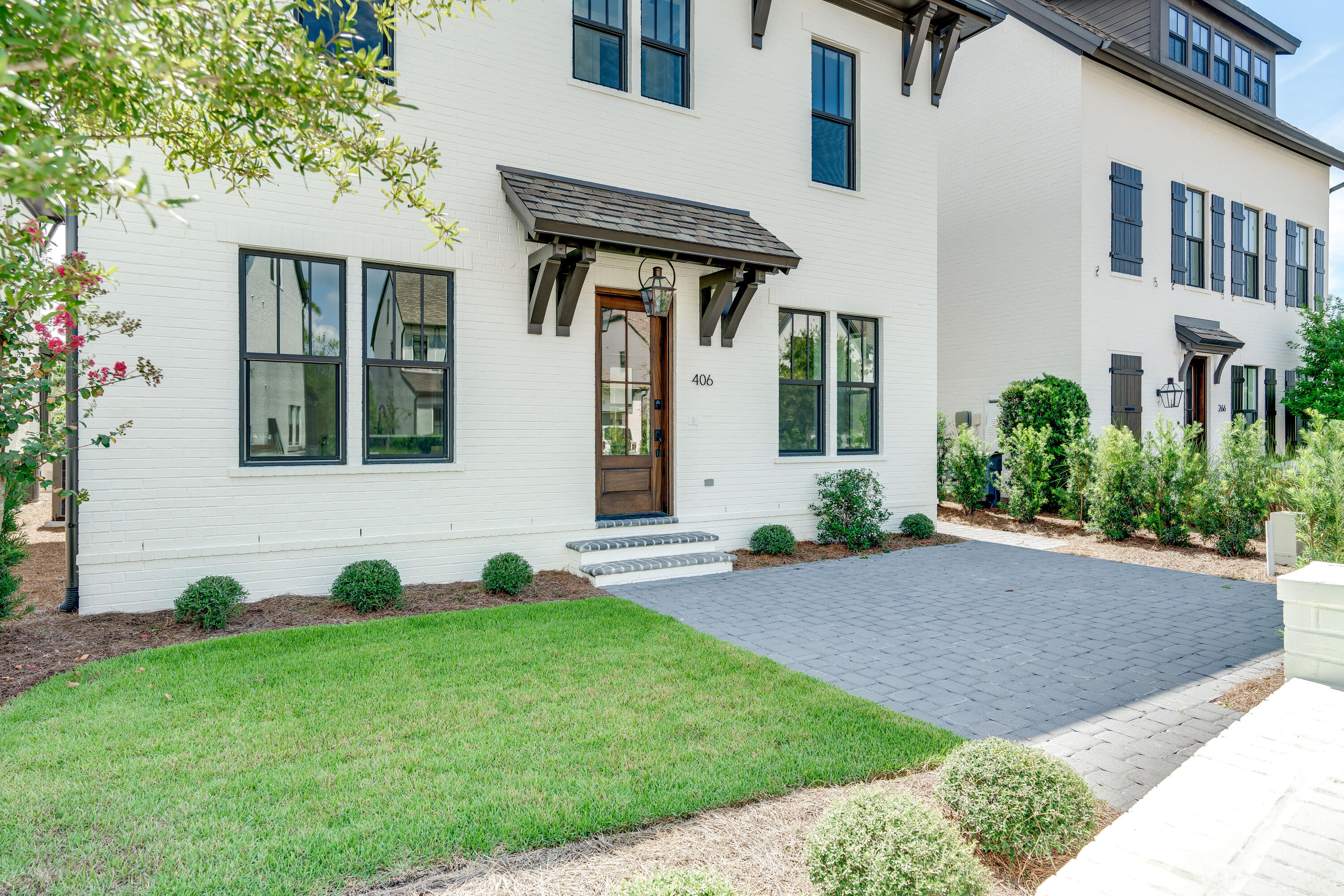 406 Ridgewalk Circle Santa Rosa Beach, FL 32459 - Photo 1 of 69 a house view with a garden space