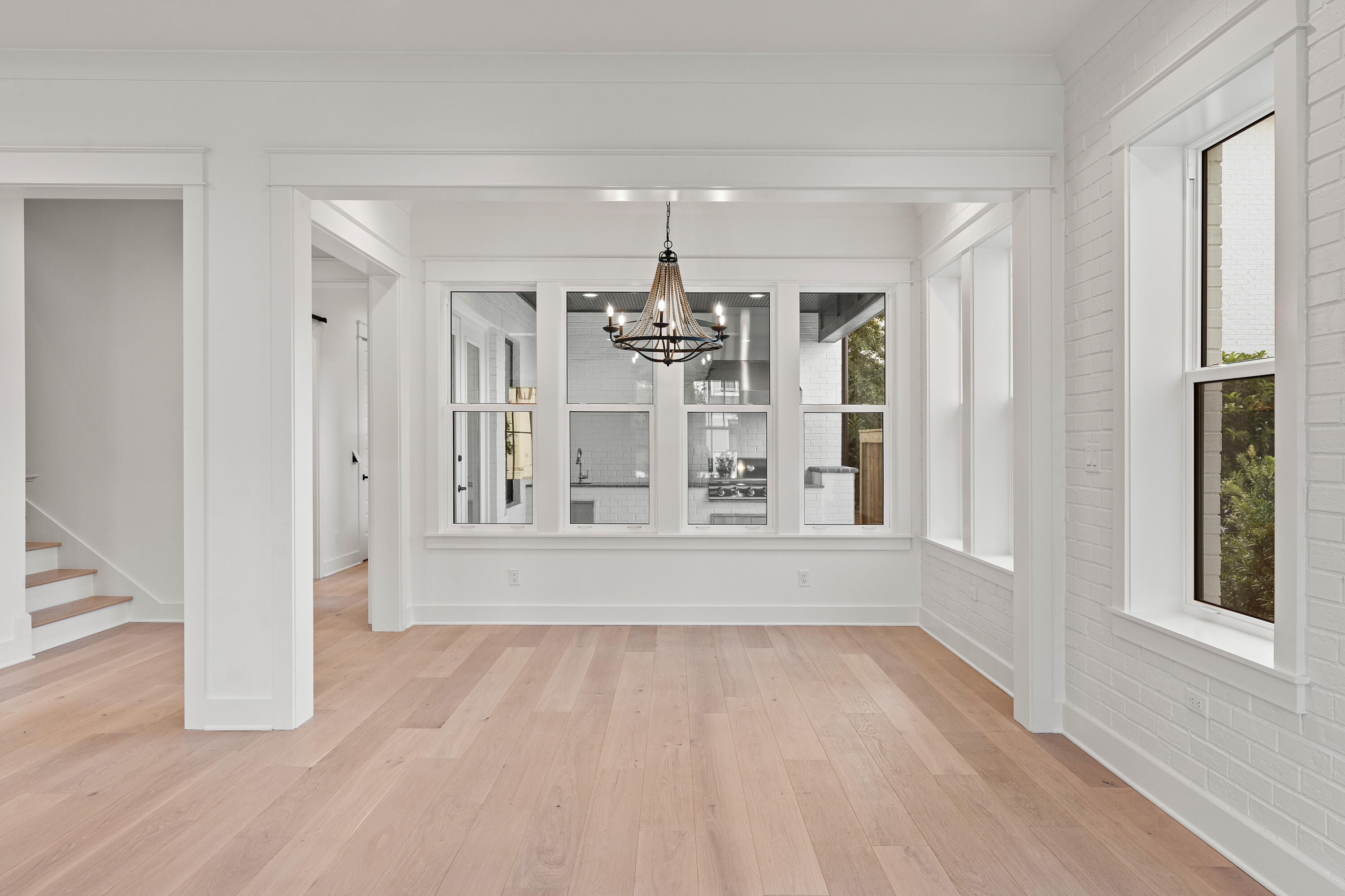 406 Ridgewalk Circle Santa Rosa Beach, FL 32459 - Photo 15 of 69 wooden floor in an empty room with a window
