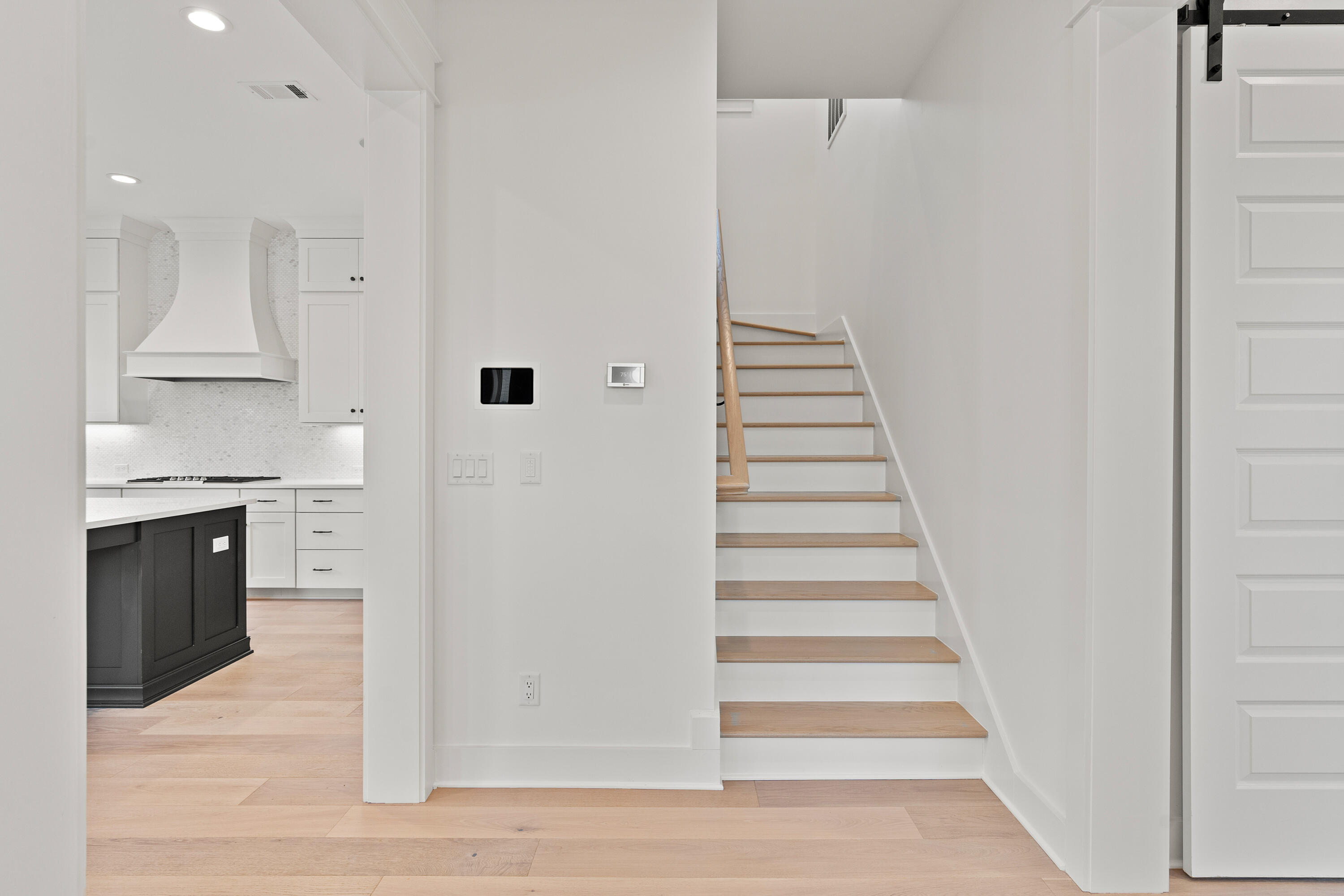 406 Ridgewalk Circle Santa Rosa Beach, FL 32459 - Photo 24 of 69 a view of an entryway with wooden floor