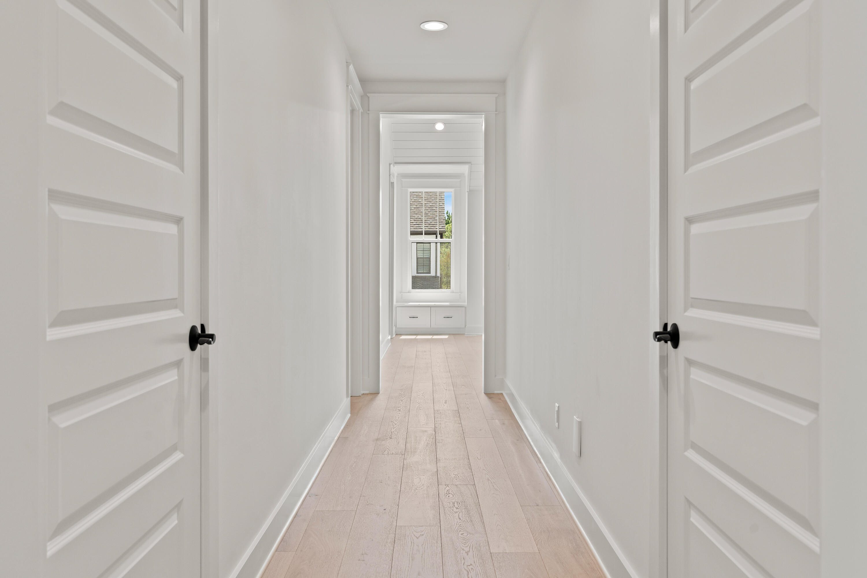 406 Ridgewalk Circle Santa Rosa Beach, FL 32459 - Photo 30 of 69 a view of a hallway with wooden floor and closet