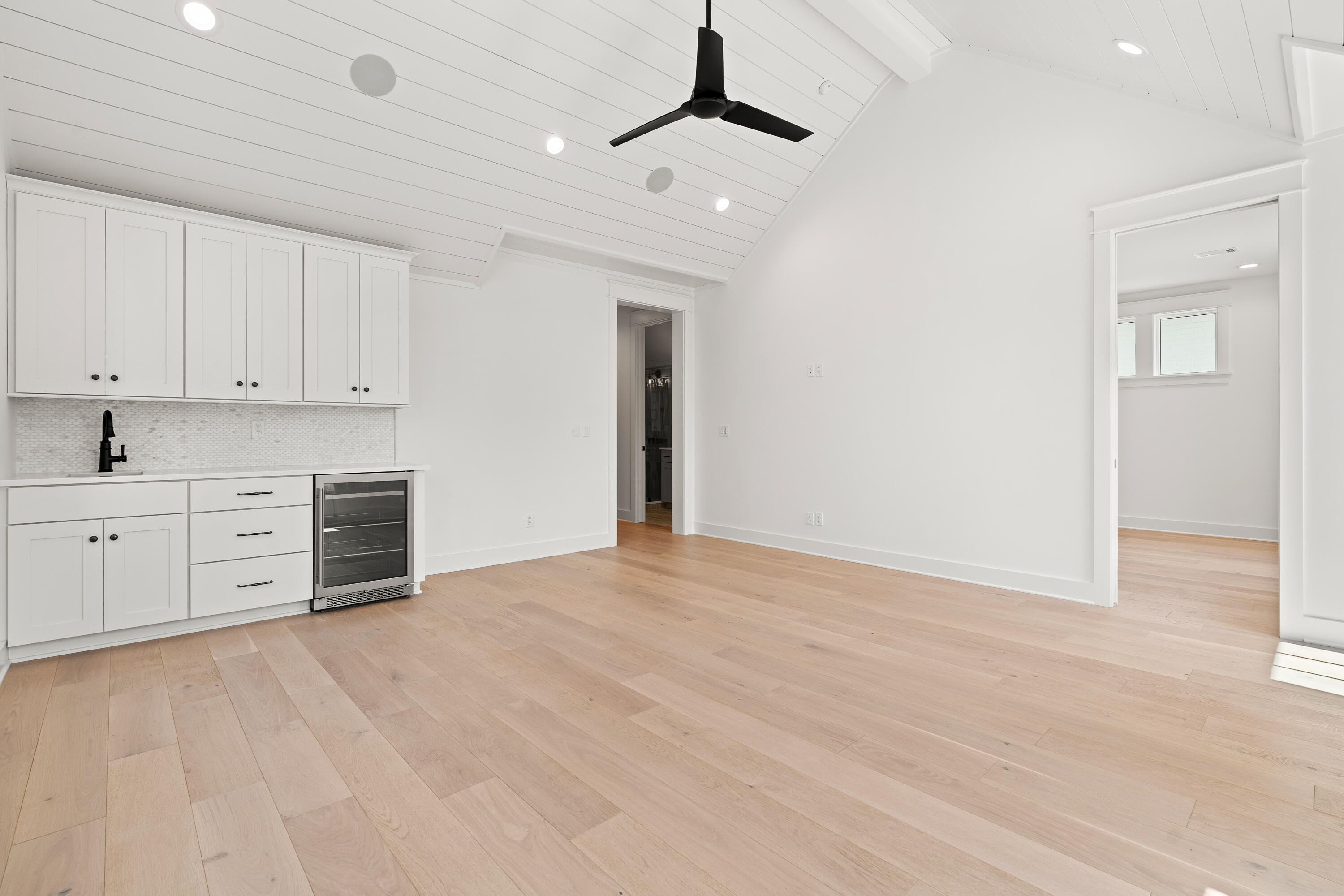 406 Ridgewalk Circle Santa Rosa Beach, FL 32459 - Photo 32 of 69 a view of an empty room with a kitchen